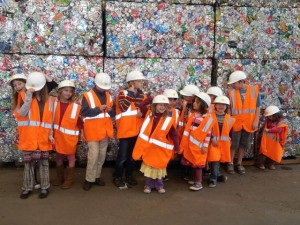 Our kids lined up in front of a few day's worth of aluminum cans used by residents of the City of Santa Cruz (and this is outside of tourist season).